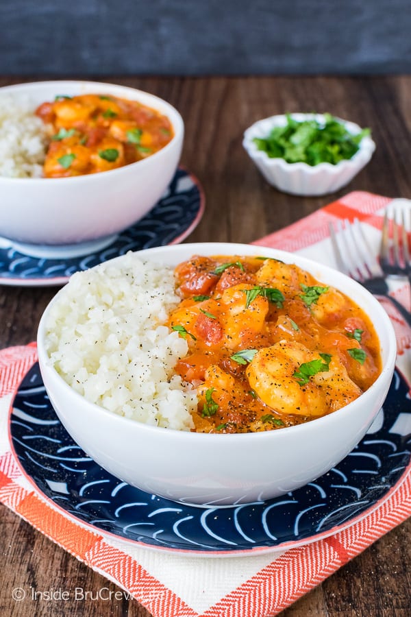Coconut Curry Shrimp - tomatoes and spices give this easy shrimp dinner a delicious flavor. Serve it with a bowl of cauliflower rice for an easy healthy dinner!