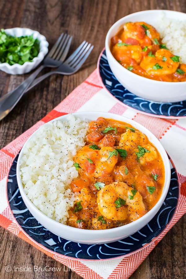 Coconut Curry Shrimp - an easy curry sauce loaded with veggies and shrimp makes a delicious and healthy dinner recipe. Perfect 30 minute meal for busy nights.