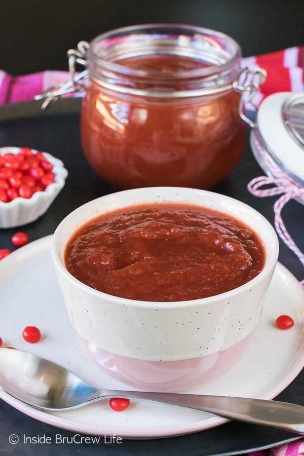 Crock Pot Cinnamon Strawberry Applesauce - this easy three ingredient applesauce has a sweet and cinnamon spice flavor. Great recipe to make in the crock pot! #apple #cinnamon #redhots #crockpot #recipe #applesauce #strawberry #homemade #easy