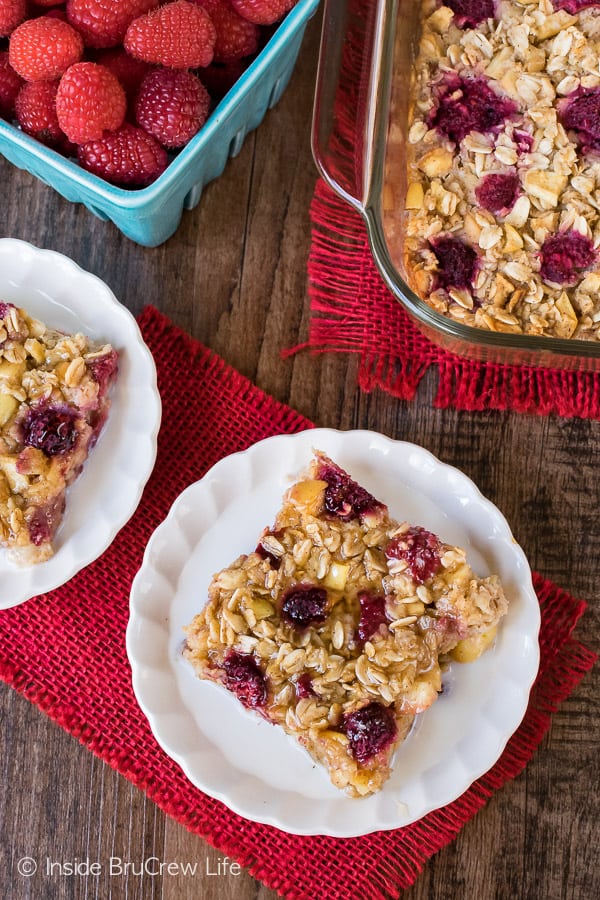 Raspberry Apple Baked Oatmeal - easy breakfast bake loaded with fruit and honey. Great recipe to have ready for busy mornings. #oatmeal #apple #raspberry #bakedoatmeal #easy #recipe #breakfast 