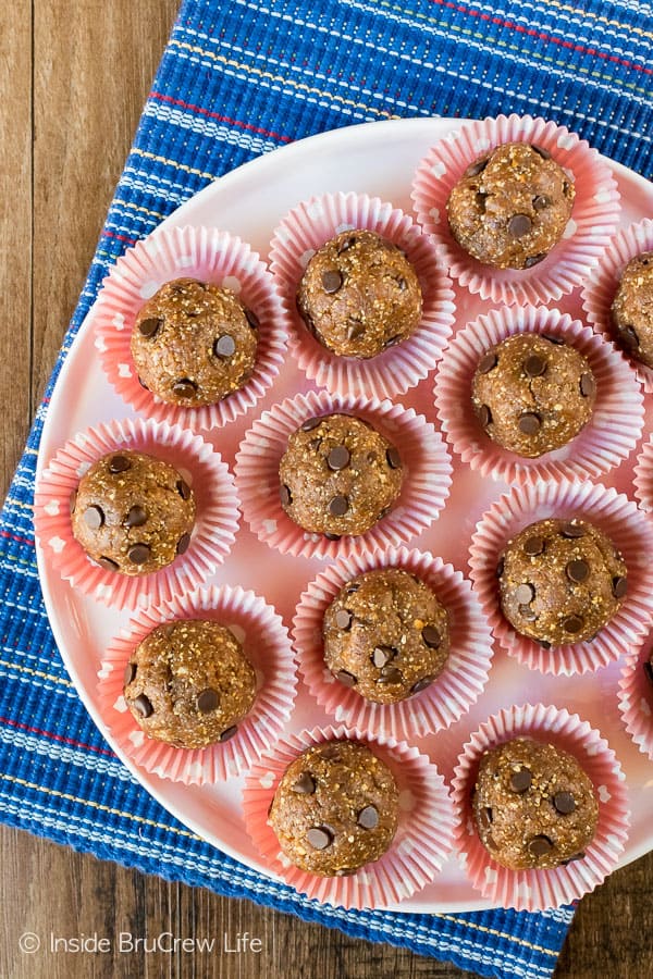 Healthy Peanut Butter Chocolate Chip Bites - these little healthy bites are made with just 4 ingredients and can be in your refrigerator in less than 10 minutes. Great recipe to make for healthy snacking. #nobake #healthysnack #peanutbutter #chocolate #energybites #sweettreat #homemade #healthy 