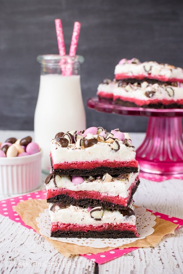 Neapolitan Sugar Cookie Bars - vanilla frosting and colored candies make these chocolate and strawberry cookies a fun dessert to make and eat. Great recipe to share at parties and picnics. #cookies #chocolate #strawberry #vanilla #sugarcookies #easydesserts #barcookies