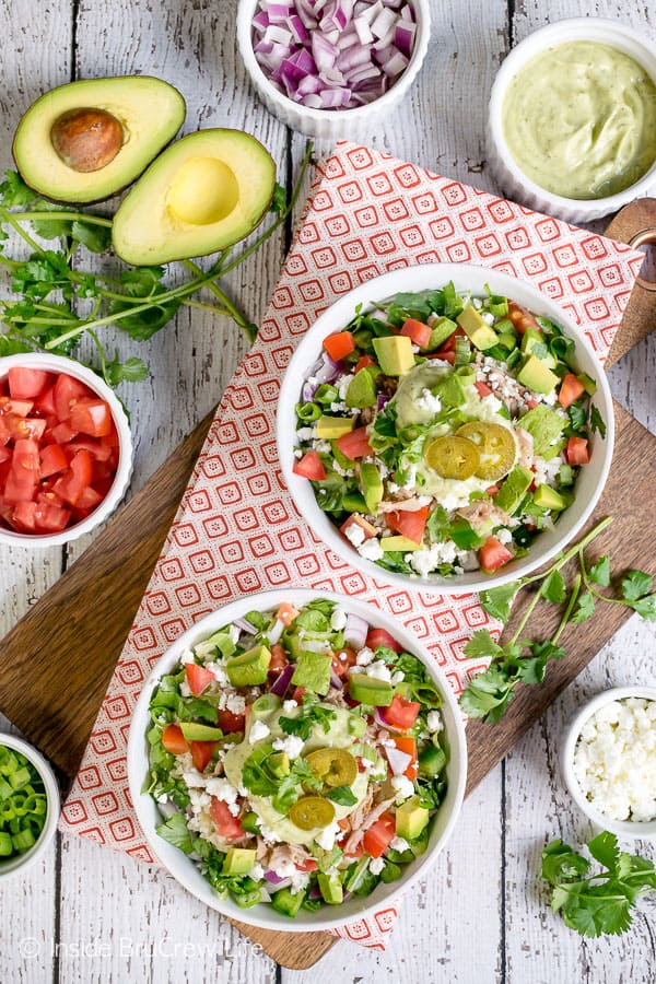 Healthy Pulled Pork Burrito Bowls - fill bowls with lots of different chopped veggies and let everyone customize their own burrito bowl. Make this easy dinner recipe for busy nights! #healthy #leanandgreen #pulledpork #burritobowls #dinner #recipe #easy