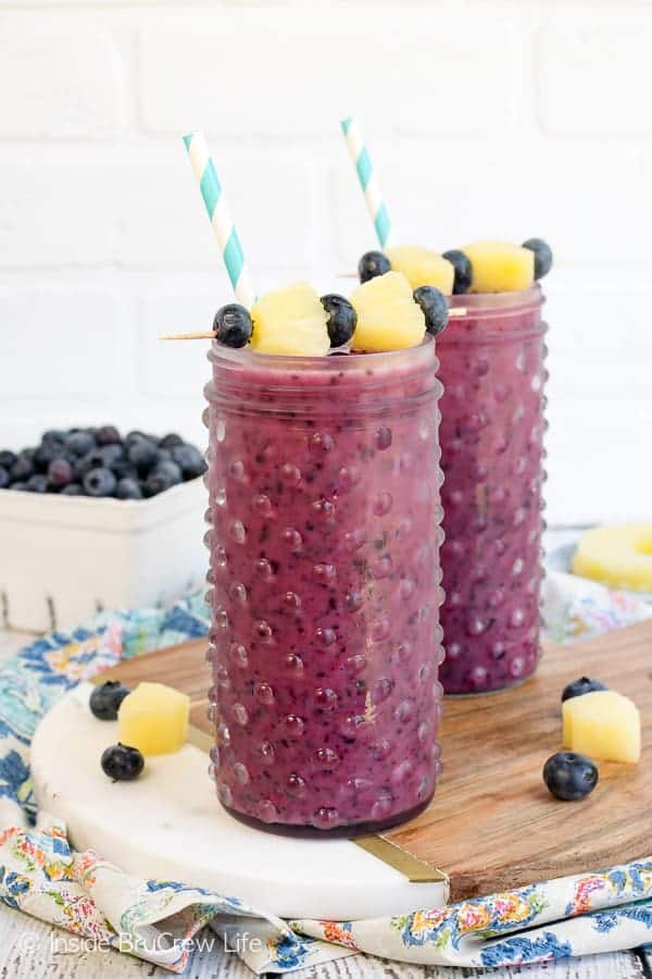 Blueberry Pineapple Slushies - this easy three ingredient fruit slushie is a delicious and refreshing drink. Make this easy recipe for hot summer days! #fruitslushies #homemade #easy #recipe #blueberry #ad #pineapple #frozendrinks