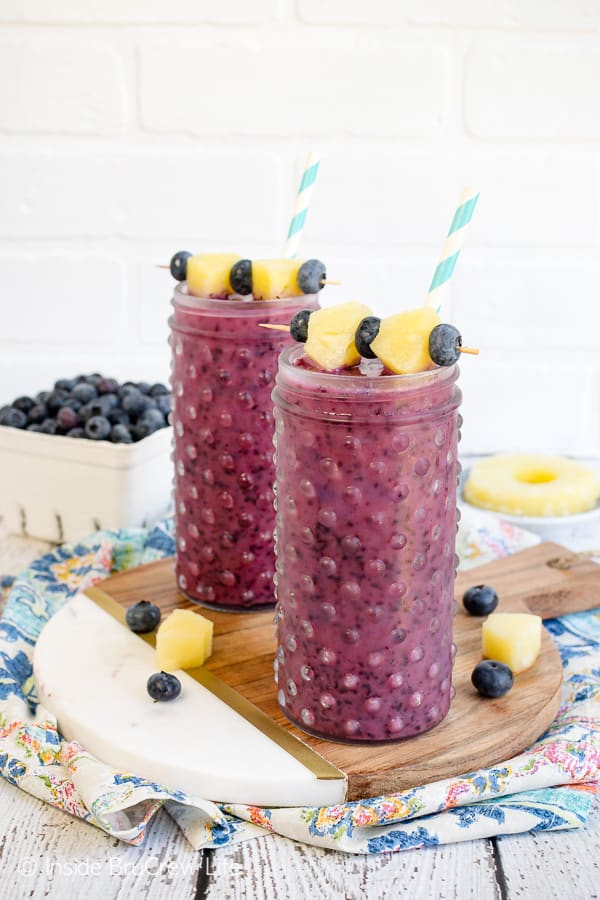 Blueberry Pineapple Slushies - these easy fruit slushies are made with just three ingredients. Make this refreshing recipe for hot summer days! #fruitslushies #homemade #easy #recipe #blueberry #ad #pineapple #frozendrinks