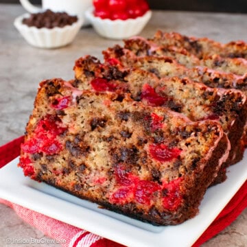 Slices of cherry banana bread on a white plate.