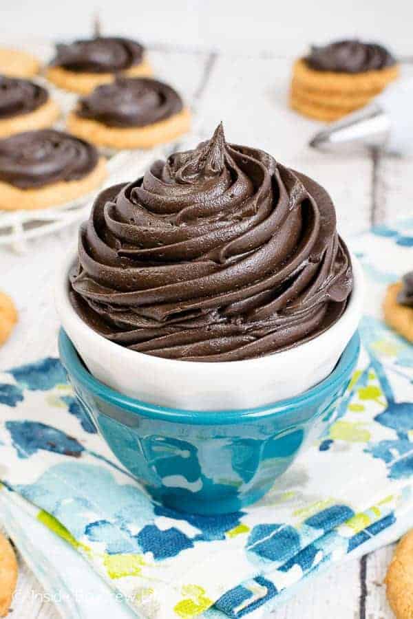 Dark Chocolate Buttercream Frosting - rich creamy homemade frosting made with dark cocoa powder is perfect for any dessert. Try this easy recipe for cakes, cupcakes, and cookies. #chocolate #darkchocolate #frosting #buttercream #homemade