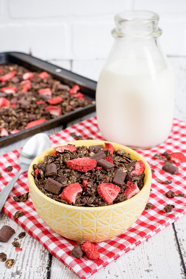 Chocolate Covered Strawberry Granola - this easy homemade chocolate granola is loaded with chocolate chunks and strawberries. It's delicious with milk or yogurt. Great recipe to try for breakfast or snacks. #homemade #chocolate #breakfast #snackmix #strawberry #afterschoolsnack #healthy #healthysnack