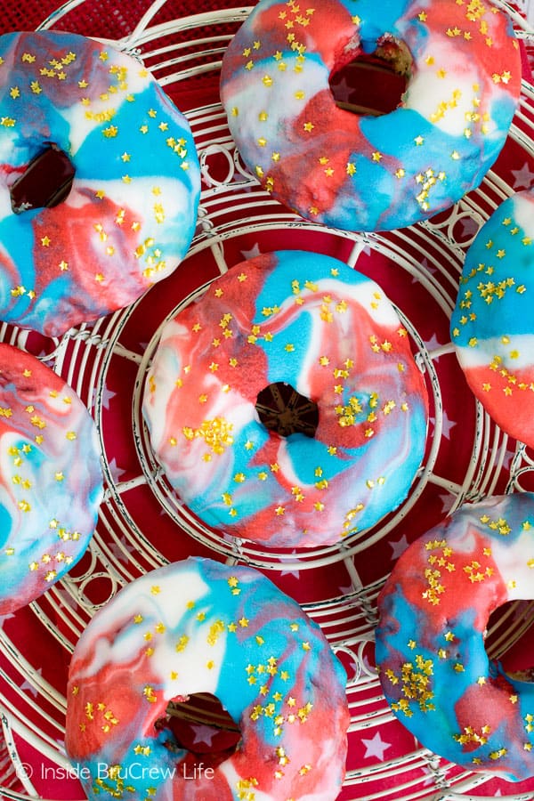 Patriotic Glazed Funfetti Donuts - gold star sprinkles and a red, white, and blue glaze make these donuts so fun. Make this recipe for Fourth of July mornings. #donuts #homemade #funfetti #redwhiteandblue #galaxydonuts #patriotic #4thofJuly #summer