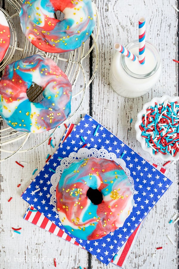 Patriotic Glazed Funfetti Donuts - a swirl of red, white, and blue glaze make these a fun summer breakfast. Make this recipe for the Fourth of July. #donuts #homemade #funfetti #redwhiteandblue #galaxydonuts #patriotic #4thofJuly #summer