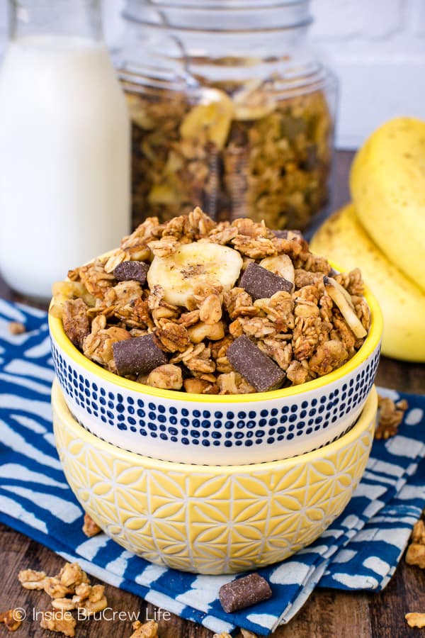 Peanut Butter Banana Chocolate Chunk Granola - chocolate, peanut butter, and banana make this homemade granola a great breakfast or snack choice. Make this recipe today and watch it disappear. #homemade #granola #banana #chocolate #peanutbutter #breakfast #snackmix #snacking