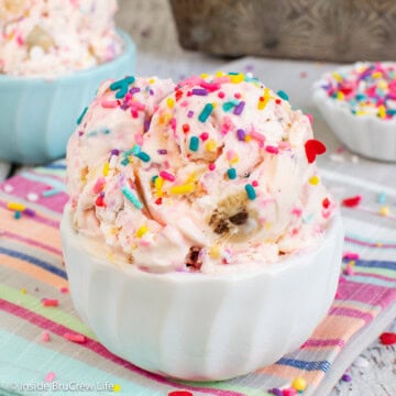 A white bowl filled with confetti ice cream.