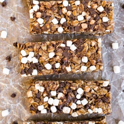 Overhead picture of a row of nutella s'mores granola bars lined up on a cutting board