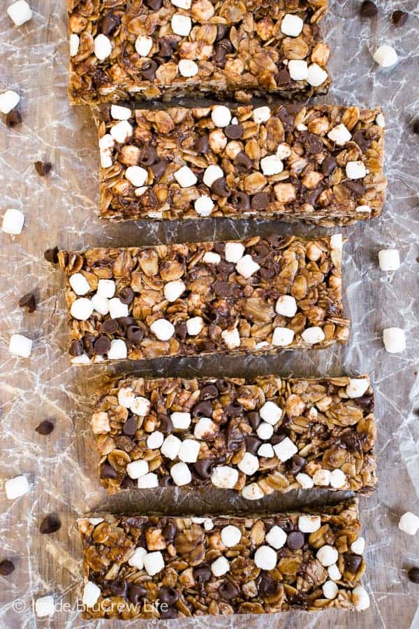 Overhead picture of a row of nutella s'mores granola bars lined up on wax paper