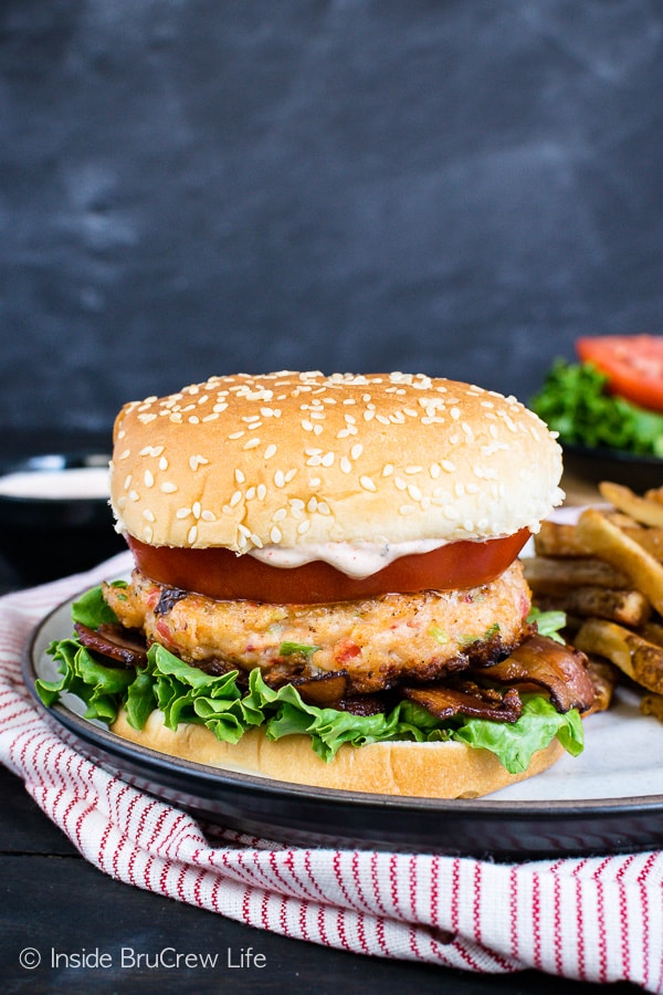 Homemade Cajun Shrimp Burgers - these easy shrimp burgers are loaded with lots of flavor. Enjoy them on a bun with tomatoes and bacon or on a lettuce wrap if you are eating healthy! #shrimp #burger #healthy #dinner #recipe #cajun #homemade