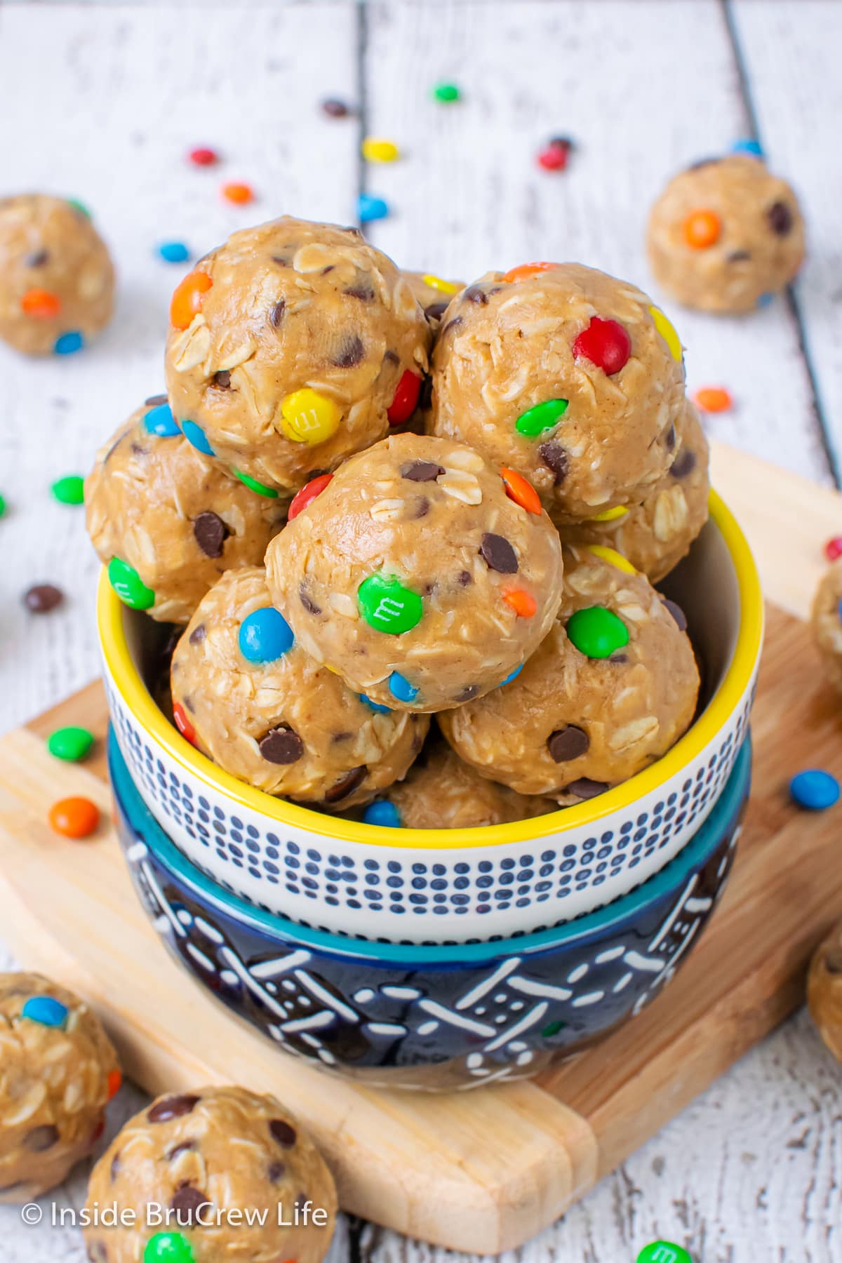 A bowl filled with monster cookie dough bites.