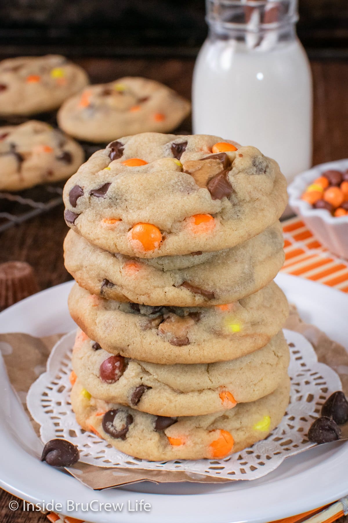 A stack of peanut butter pudding cookies on a white plate.