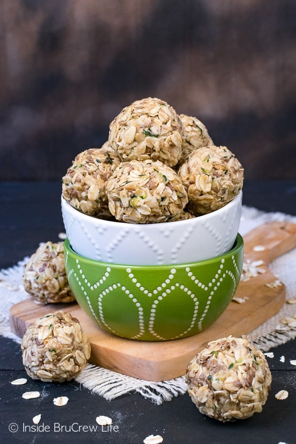 Two bowls stacked together and filled with zucchini oatmeal bites