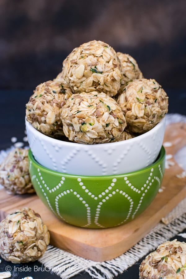 Two bowls stacked together filled with zucchini oatmeal bites