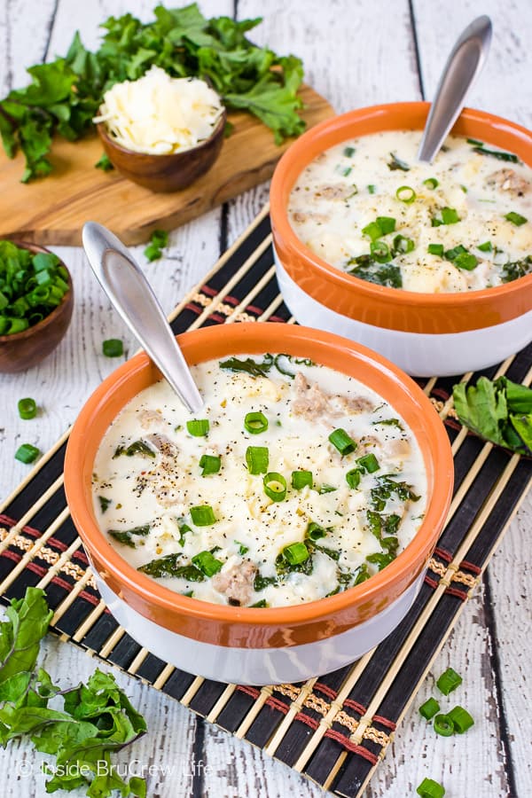 Low Carb Sausage Kale Soup - sausage, kale, and cauliflower in a creamy white broth is a low carb option when you are eating healthy! Great keto friendly soup too! #lowcarb #healthy #ketofriendly #cauliflower #sausage #soup #ad #recipe