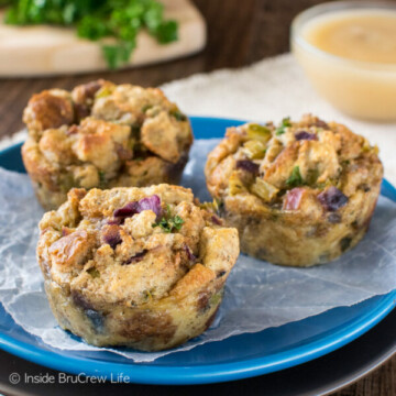 Three stuffing muffins on a blue plate