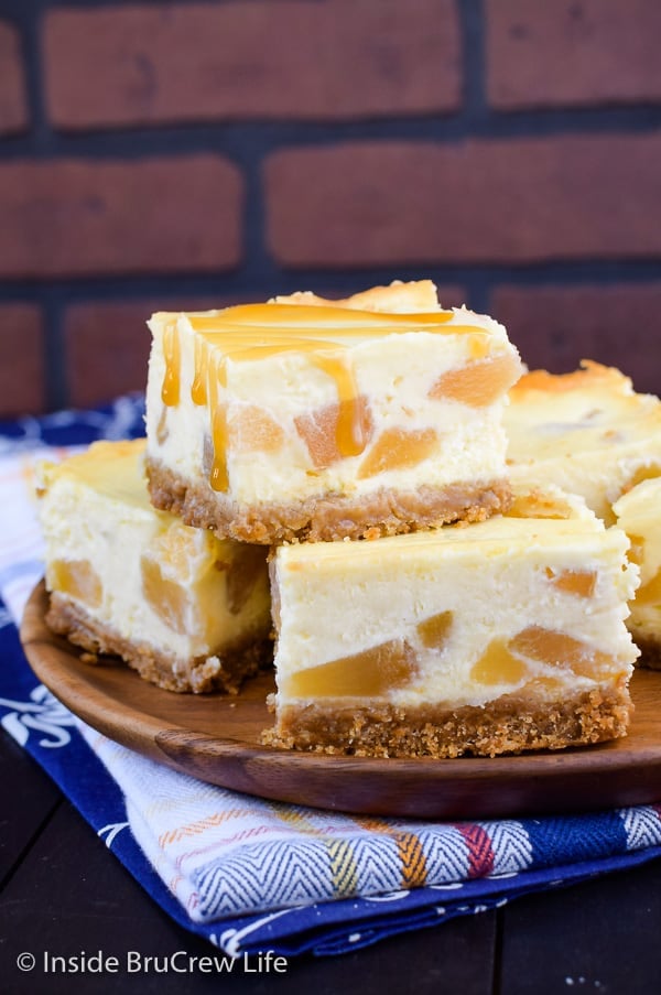 Apple Cheesecake Bars - these easy cheesecake bars are filled with apple pie filling and drizzled with salted caramel. This is a easy dessert you have to try!!! #apple #cheesecake #cheesecakebars #piefilling #dessert #easyrecipe