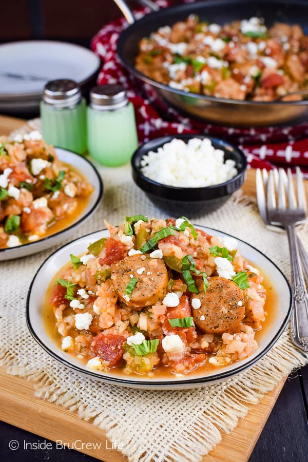 Tomato Basil Cauliflower Rice and Sausage - this easy one pan skillet meal is loaded with tomato basil cauliflower rice and chicken sausage. It's an easy and delicious meal that can be ready in minutes! #cauliflower #tomatobasil #leanandgreen #healthydinner #chickensausage