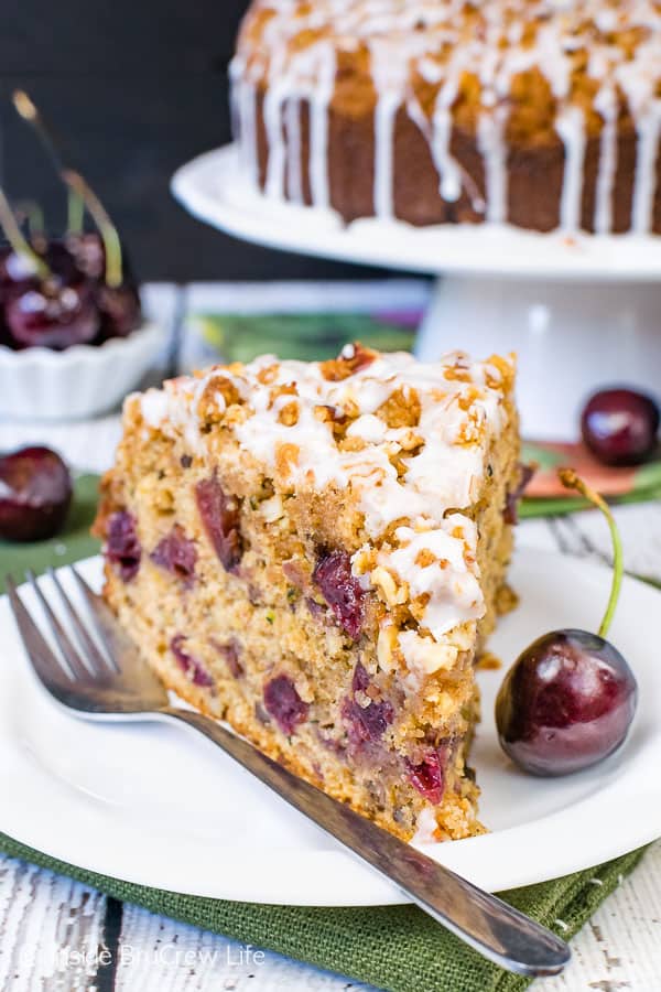 Cherry Zucchini Coffee Cake - the sweet crumble and glaze on top of this coffee cake makes it taste so good. Try this easy recipe for breakfast or brunch! #coffeecake #cherry #zucchini #breakfast #brunchrecipes
