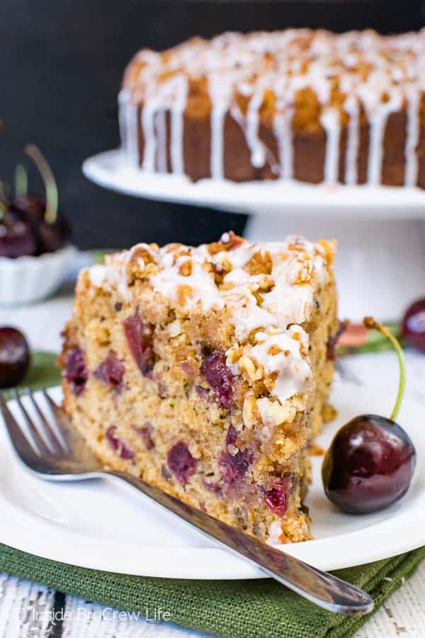 Cherry Zucchini Coffee Cake - fresh fruit and veggies make this coffee cake so good. The crumble and glaze make it even better! #coffeecake #cherry #zucchini #breakfast #brunchrecipes