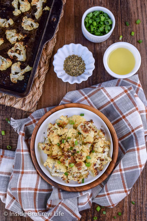 Oven Roasted Cauliflower - a pan of this roasted cauliflower is easy to make and tastes delicious. The crispy edges will have you reaching for more! #cauliflower #leanandgreen #healthy #roastedveggies #roastedcauliflower