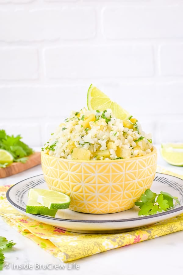 Pineapple Lime Cauliflower Rice - lime juice and pineapple chunks give this cauliflower rice a great tropical flavor. Try this easy recipe with fish, tacos, or grilled chicken dinners. #healthy #cauliflower #pineapple #rice