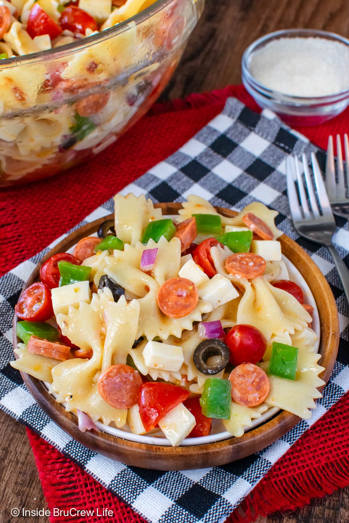 A serving of pizza pasta salad on a plate.