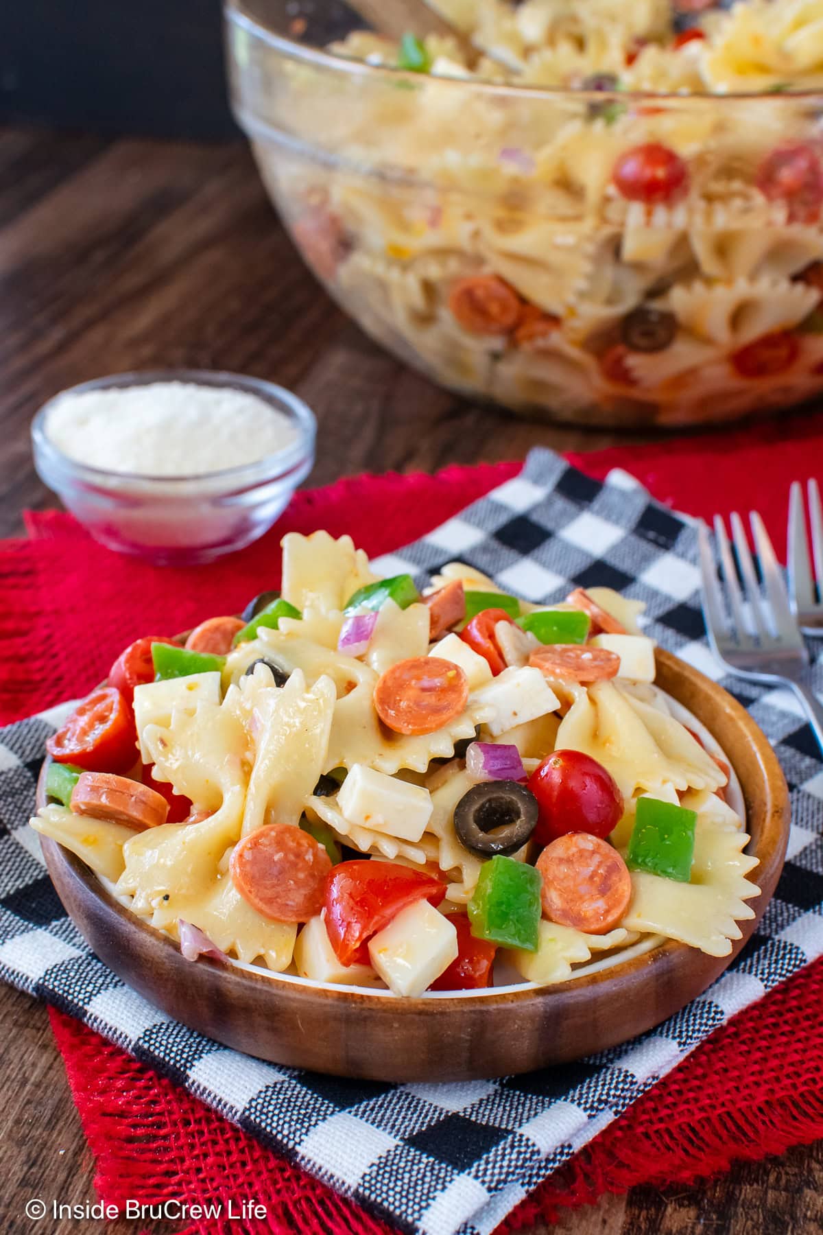 A serving of pepperoni pasta salad on a plate.