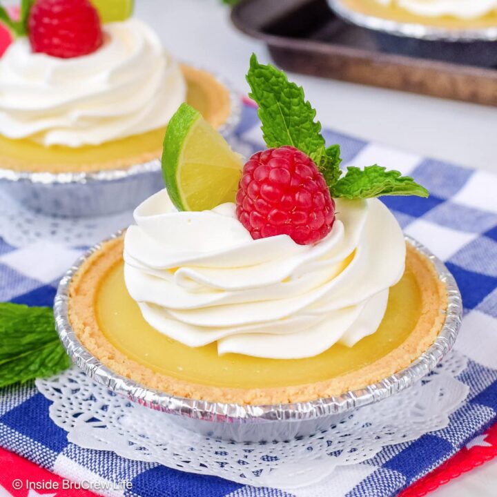 A creamy citrus pie on a blue and white towel.