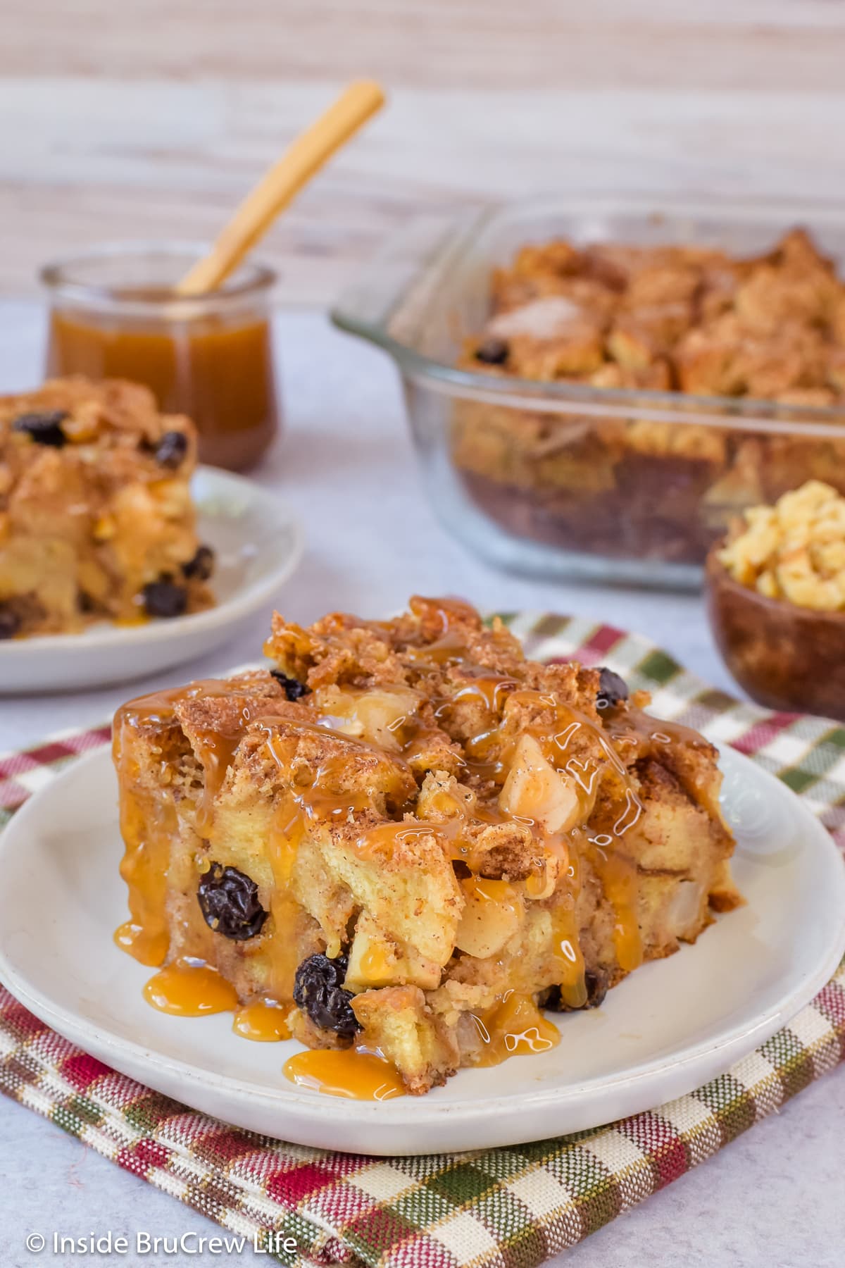 A slice of bread pudding on a plate.