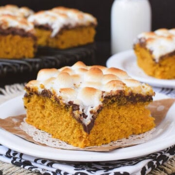 A white plate with a s'mores pumpkin bar on it.