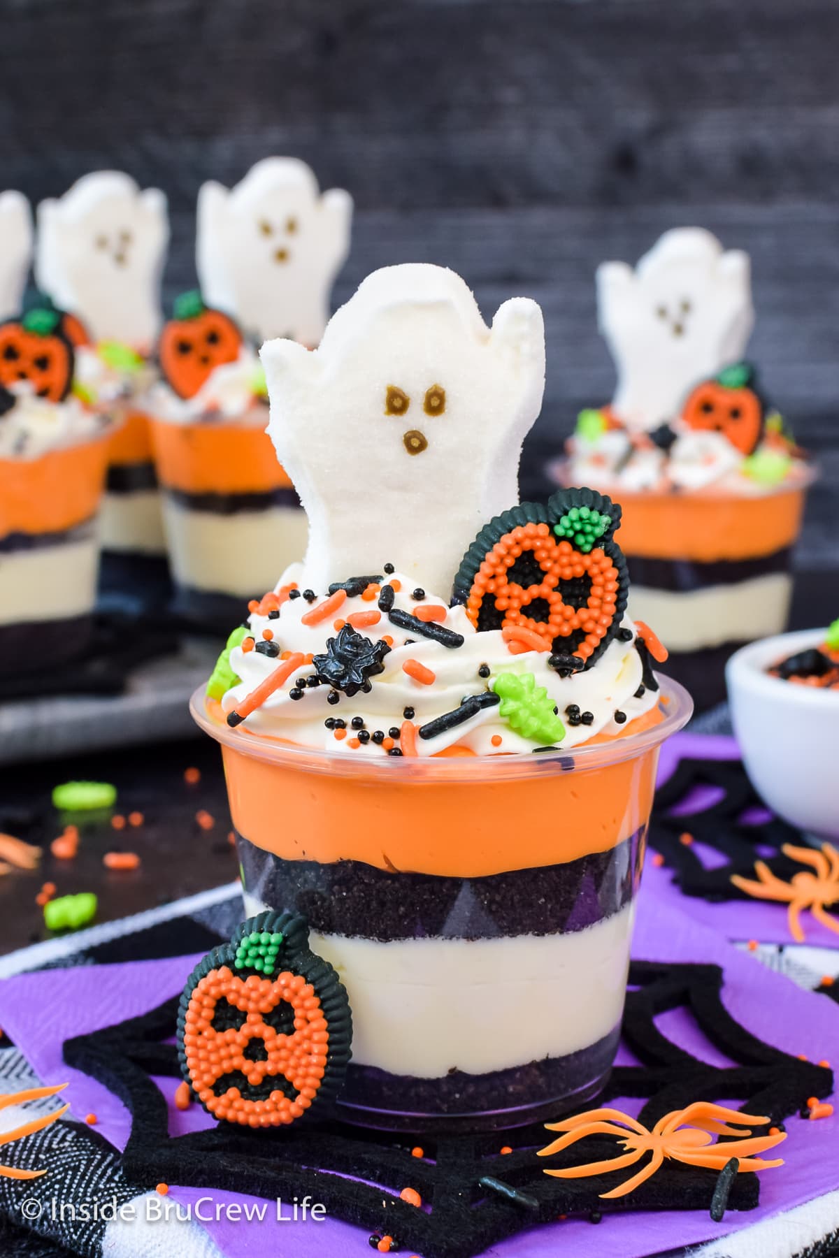 Spooky cream cheese parfaits topped with ghost peeps.