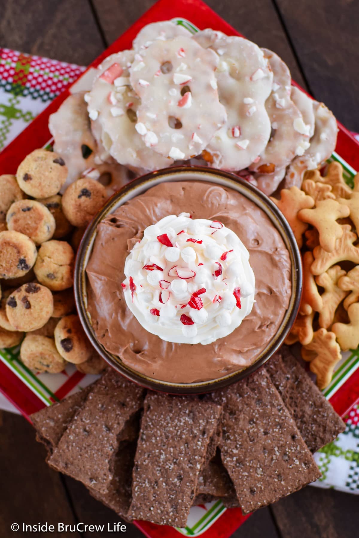 An overhead picture of a bowl of cocoa dip with cookies.