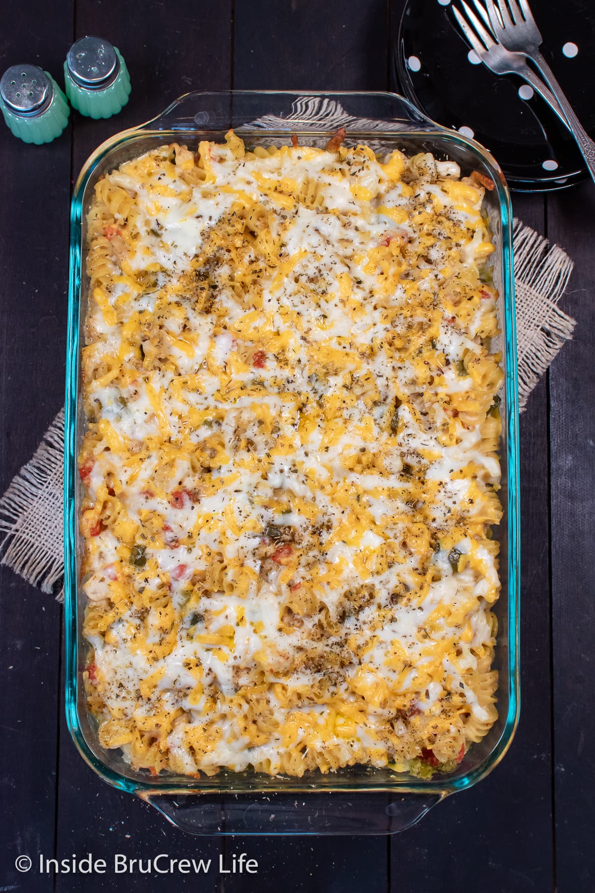 A glass dish filled with a chicken supreme casserole.