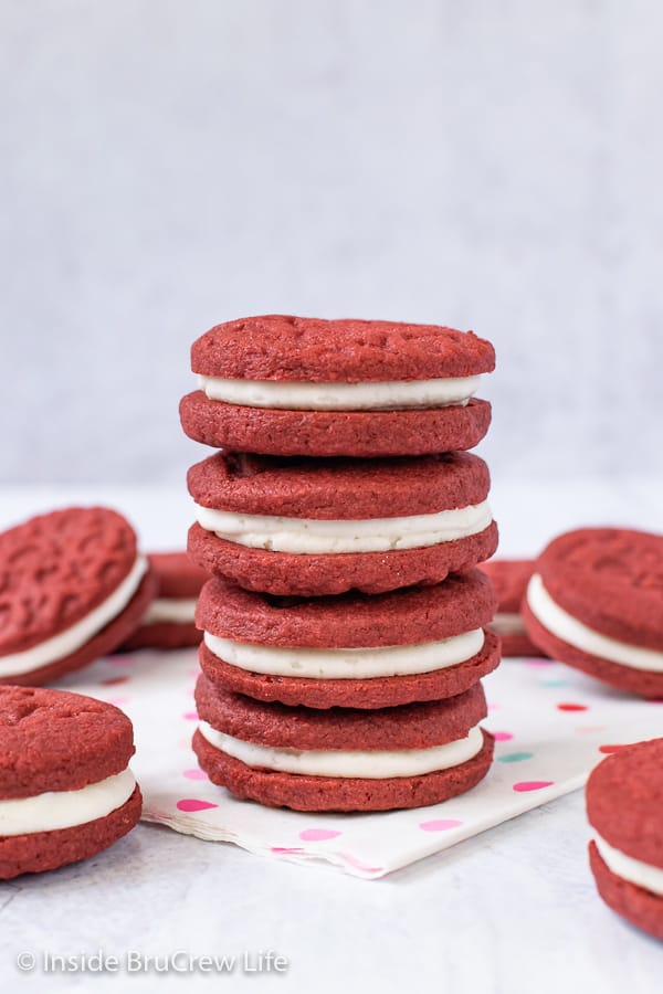 Copycat Red Velvet Oreos - these sweet red velvet wafer cookies with a cream filling are a fun copycat of the store bought treat. Easy recipe to make for parties! #redvelvet #Oreos #copycat #sandwichcookies #valentinesday #creamfilledcookies