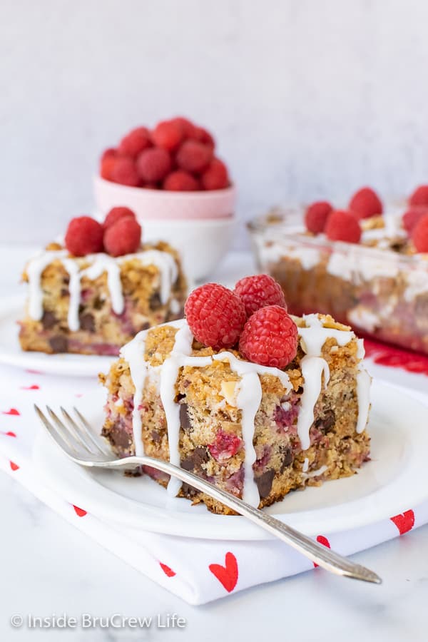 Chocolate Chip Raspberry Banana Coffee Cake - this soft banana coffee cake has fresh fruit, chocolate, and a buttery streusel on top. It is an amazing recipe to make for breakfast or brunch.
