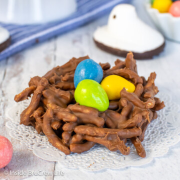 A chocolate nest cookie with candy eggs in it.