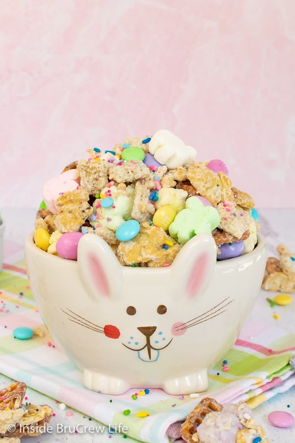 White bunny bowl filled with a sweet and salty Easter bunny snack mix.
