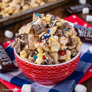A red bowl filled with s'mores popcorn.