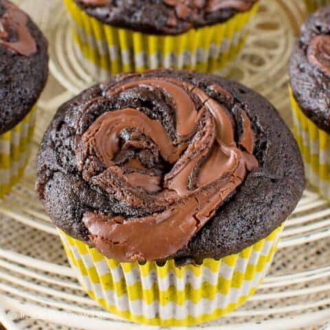 A chocolate banana muffins with Nutella swirls in top