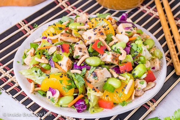 A white plate filled with Asian Chicken Salad