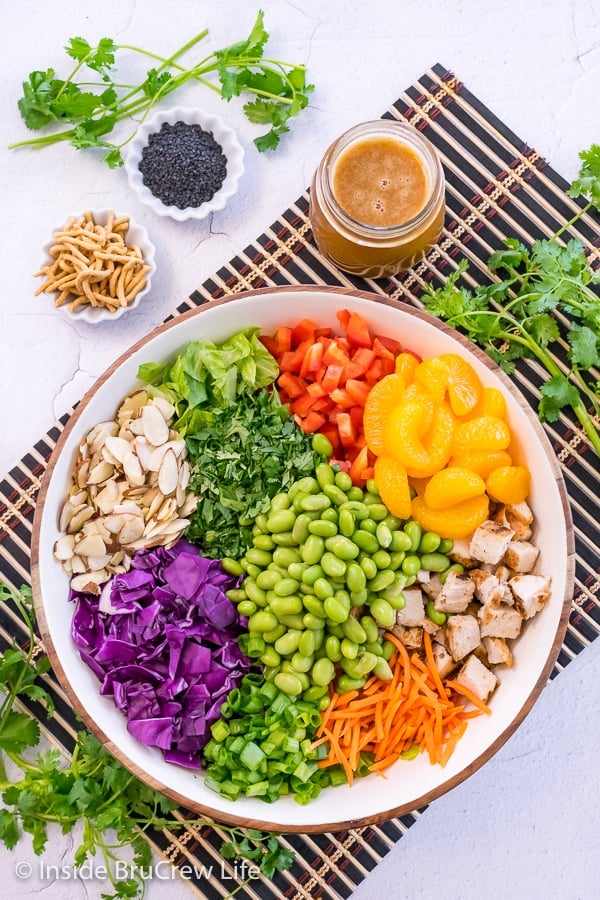 A salad bowl filled with the ingredients for an Asian Chicken Salad