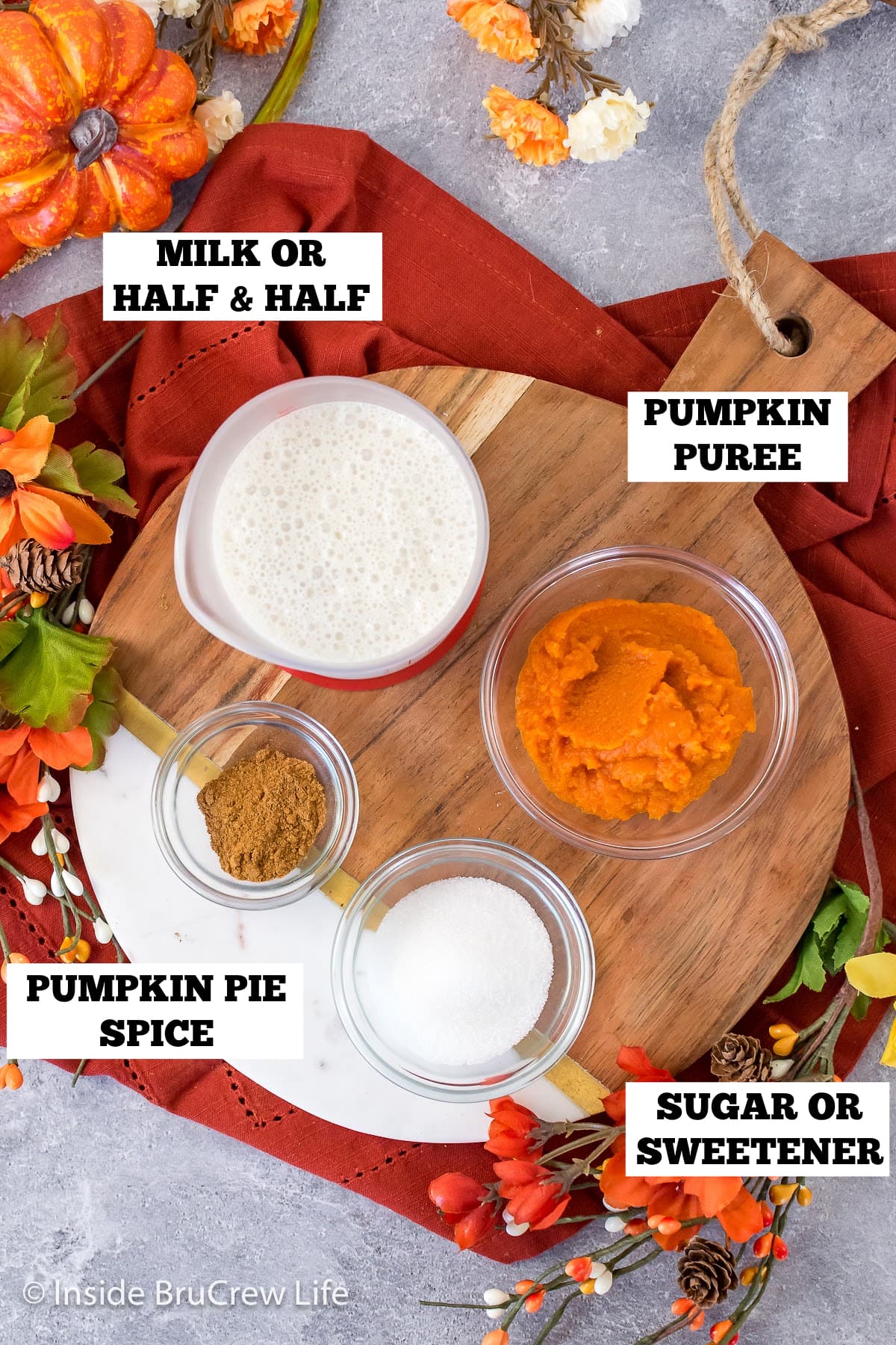 Bowls of ingredients needed to make pumpkin cold foam.