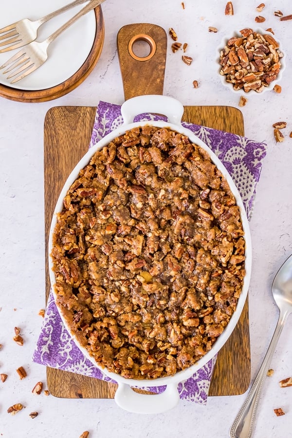 Overhead picture of a sweet potato souffle topped with a butter and sugar pecan topping