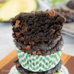 A stack of chocolate muffins made with avocados stacked up